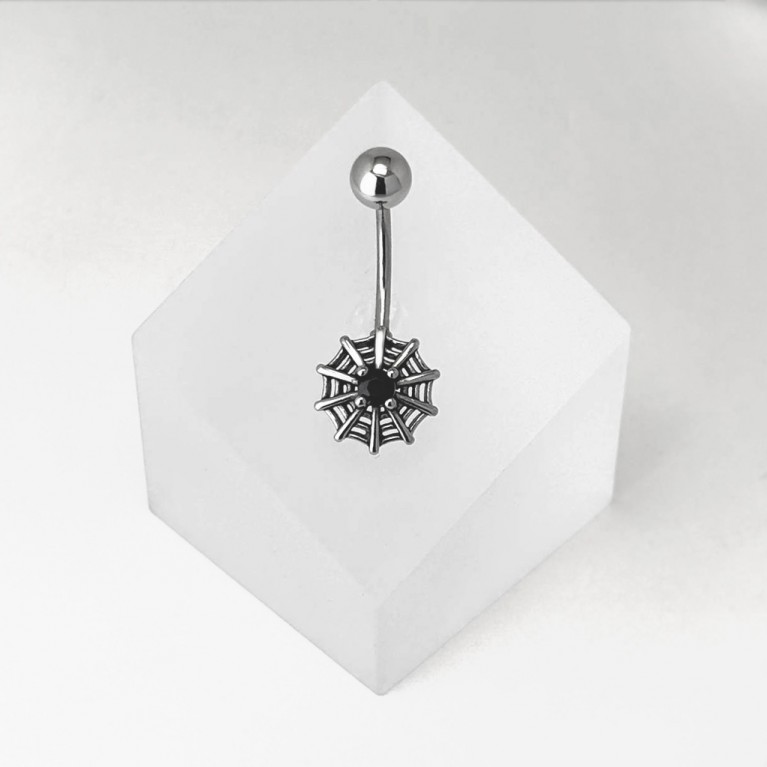 Банан в пупок паутина с черным кристаллом