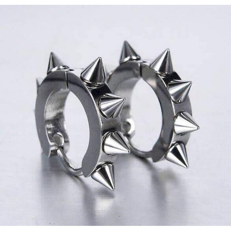 Серьга светлая с шипами